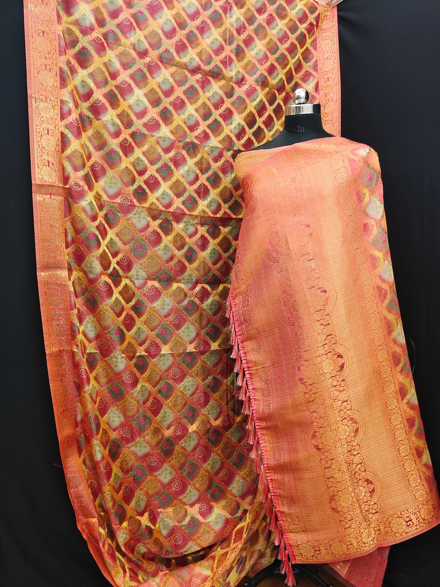 Zari woven borders and resham woven pallu and tassel saree