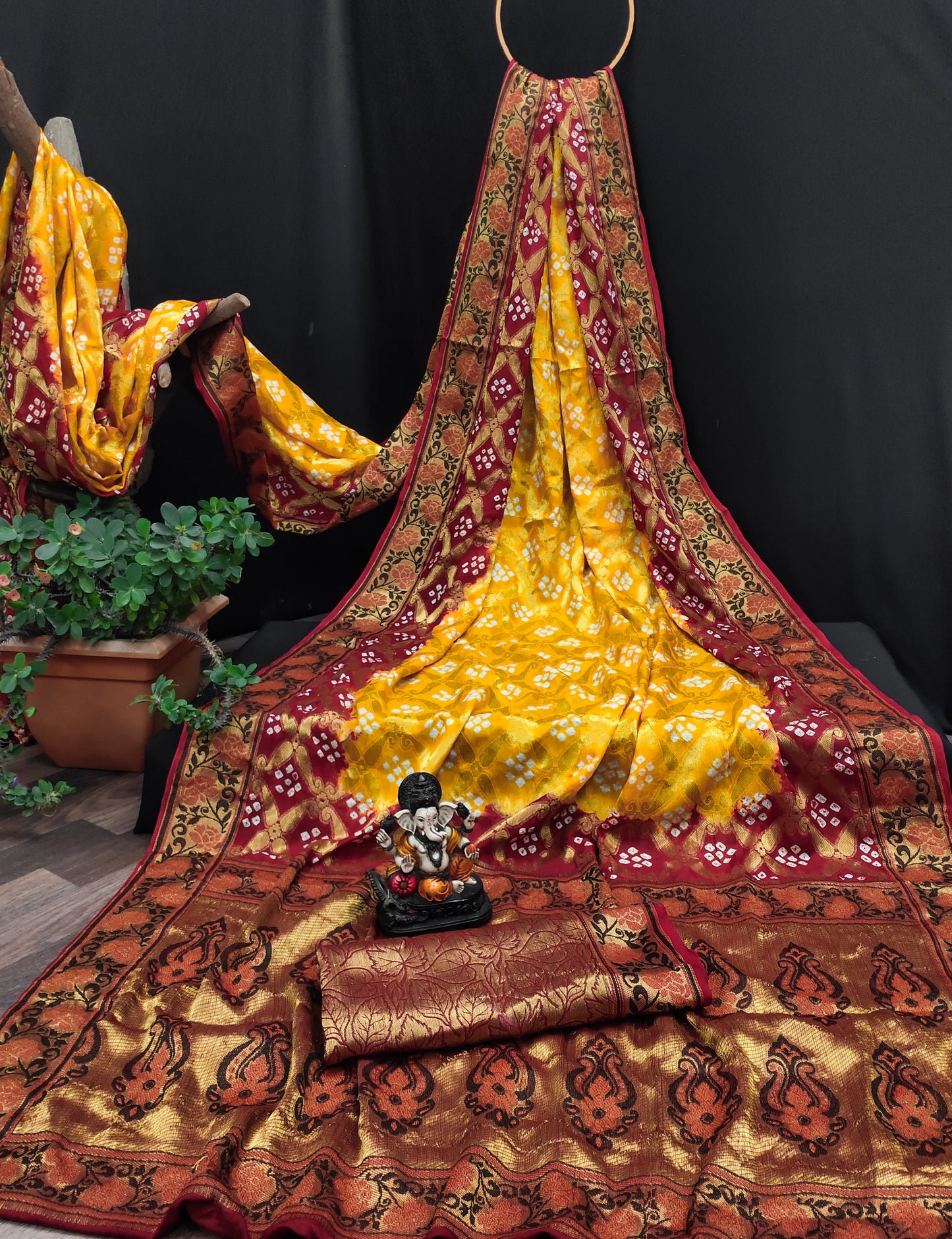 Bandhej silk drapes with Gharchola Body patterns with Minakari jari border